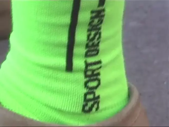 gif of green racing socks and clarks wallabees